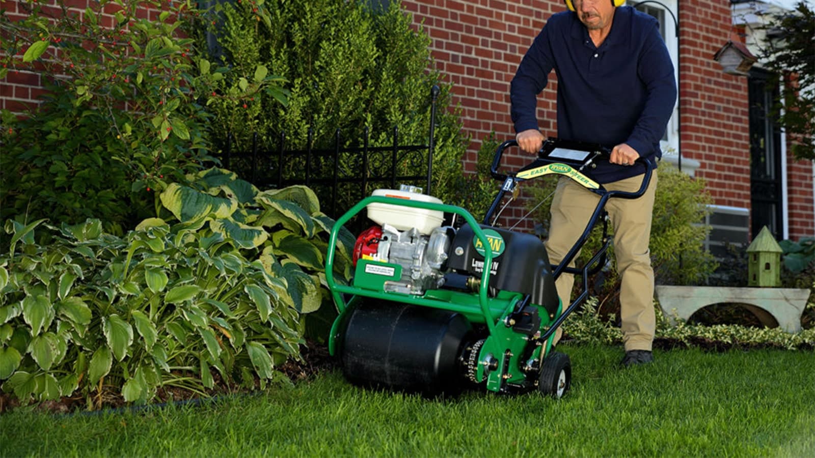 Man Pushing Ryan Aerator