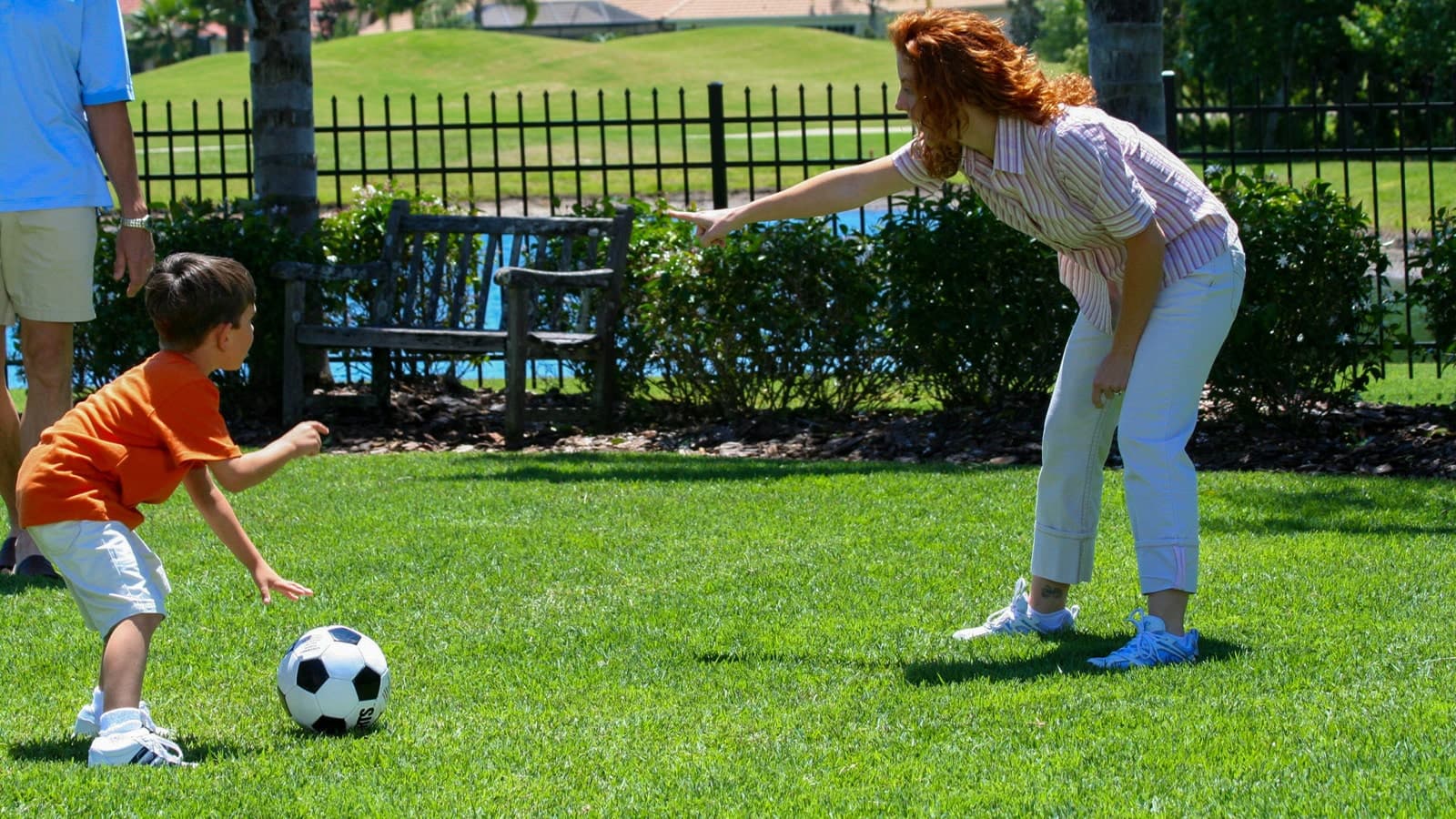 Empire Zoysia Grass Florida Family Playing Soccer